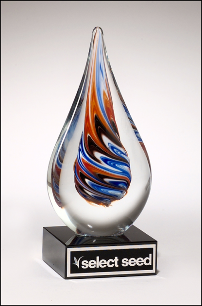 Teardrop-shaped art glass award on black glass base