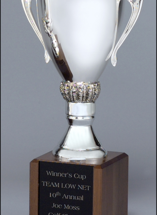 Specialty Trophy Line Silver-plated trophy cups on solid walnut bases