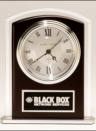 Beveled glass clock with wood accent, silver bezel and dial, three hand movement.