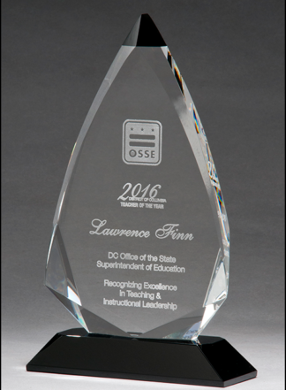 Arrow shaped crystal award with black accent on black crystal base