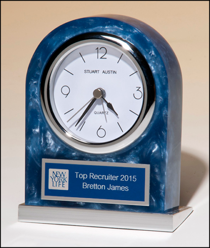 Acrylic clock with polished silver aluminum base.  Silver bezel, white dial, three-hand movement.