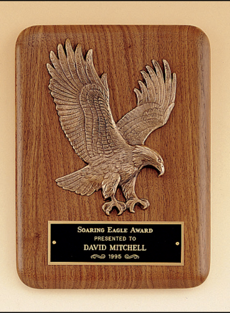Eagle Plaques American walnut plaque with a sculptured relief eagle casting.
