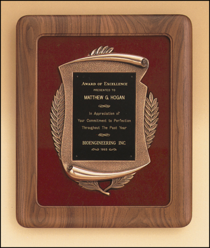 Plaques with Metal Accessories Solid american walnut Airflyte frame with a furniture finish and an antique bronze finish casting on choice of velour backgrounds.