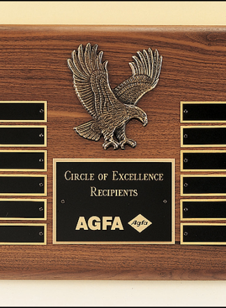 Eagle Plaques American walnut perpetual plaque with 12 black brass plates and a sculptured relief eagle casting.