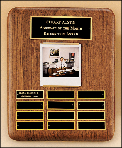 Solid American walnut Airflyte perpetual plaque with 12 plates and photograph holder.