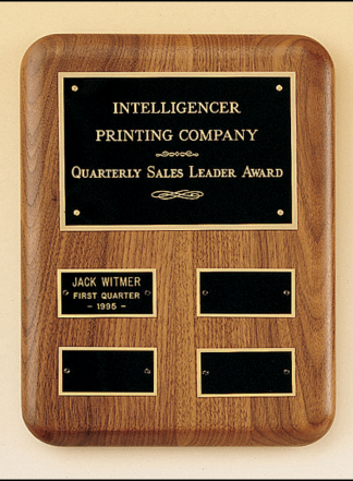 Solid American walnut quarterly award plaque with 4 plates.