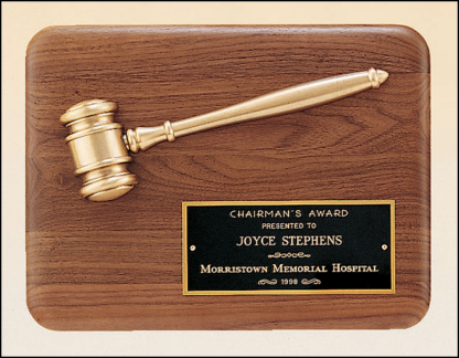 American walnut plaque with an antique bronze gavel casting.